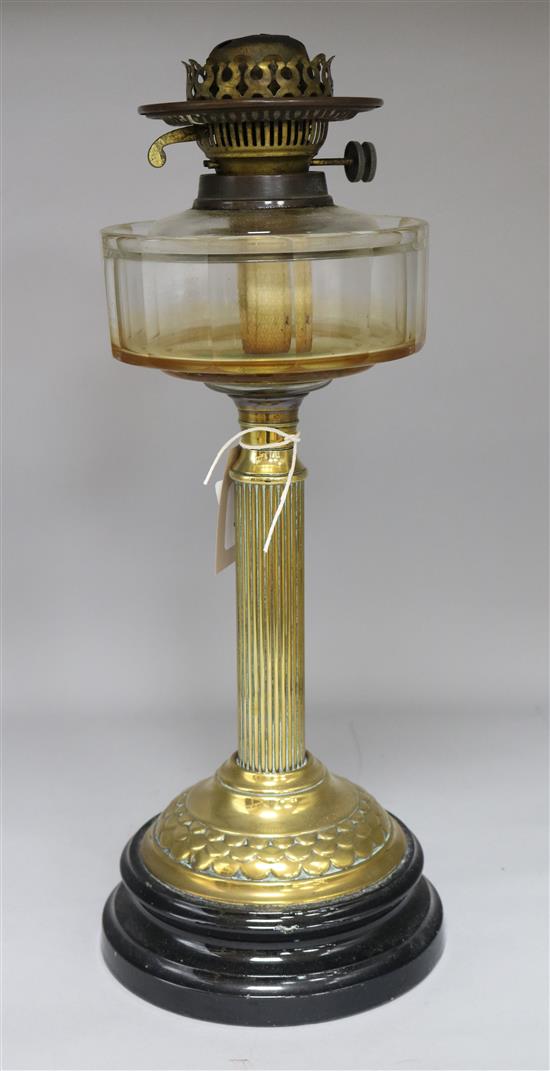 A Victorian brass and cut glass oil lamp